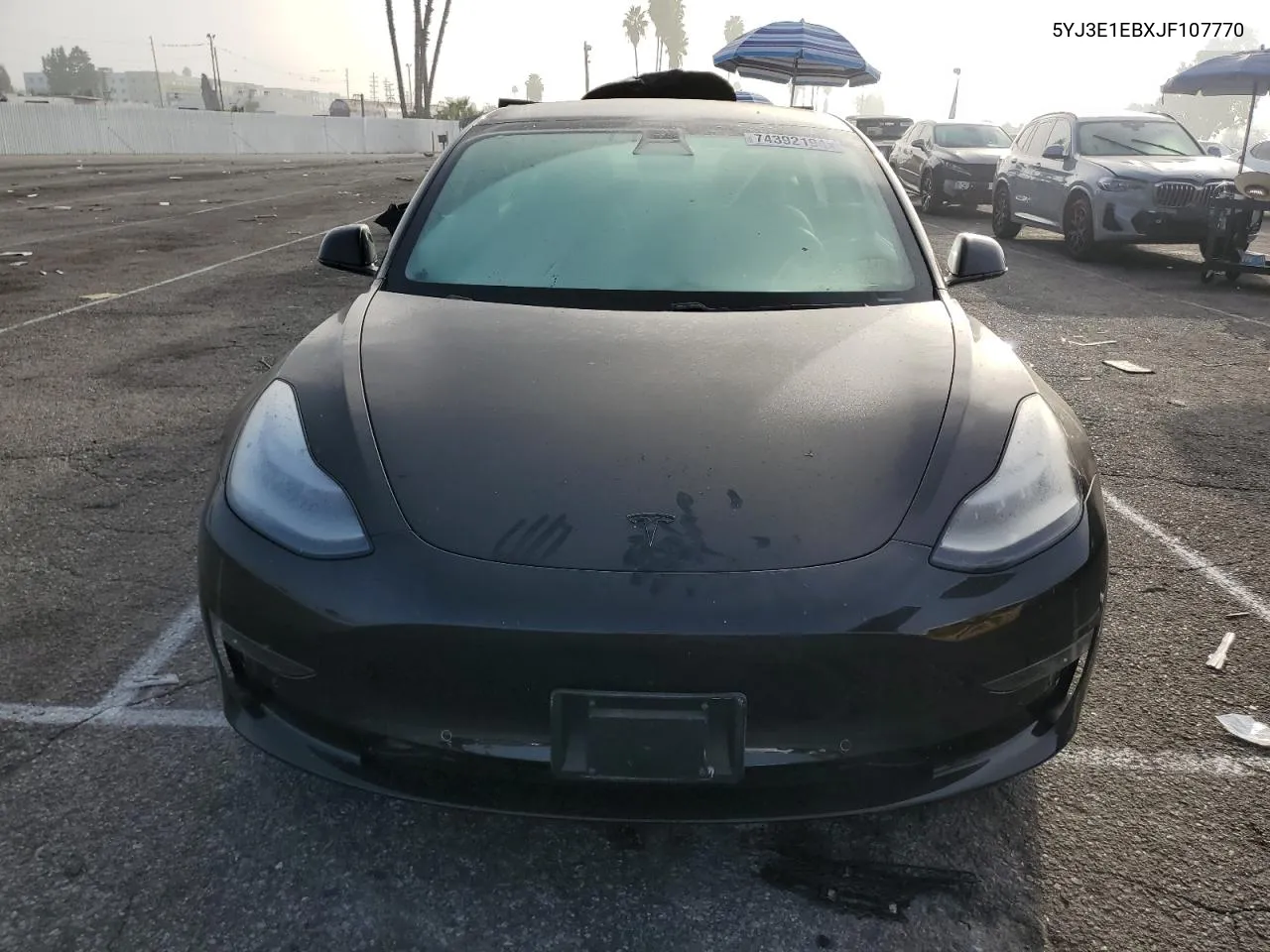 2018 Tesla Model 3 VIN: 5YJ3E1EBXJF107770 Lot: 74392194