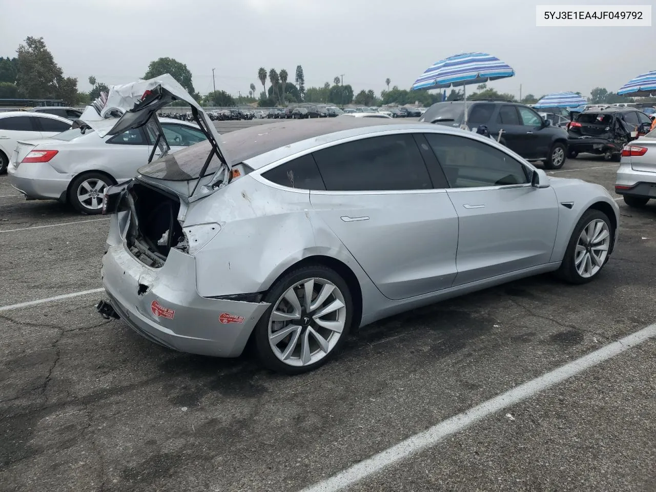 2018 Tesla Model 3 VIN: 5YJ3E1EA4JF049792 Lot: 76143134