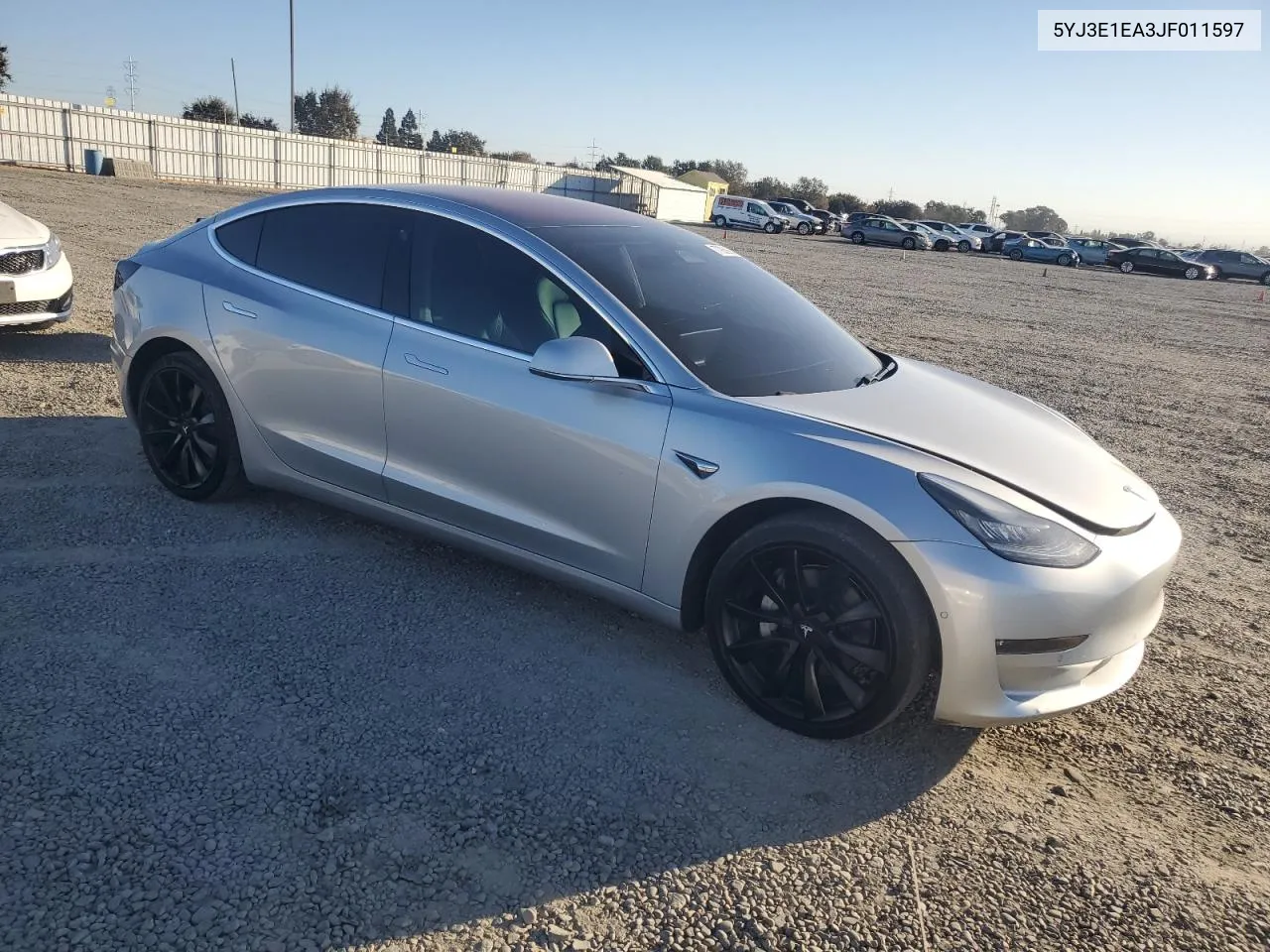 2018 Tesla Model 3 VIN: 5YJ3E1EA3JF011597 Lot: 77906664