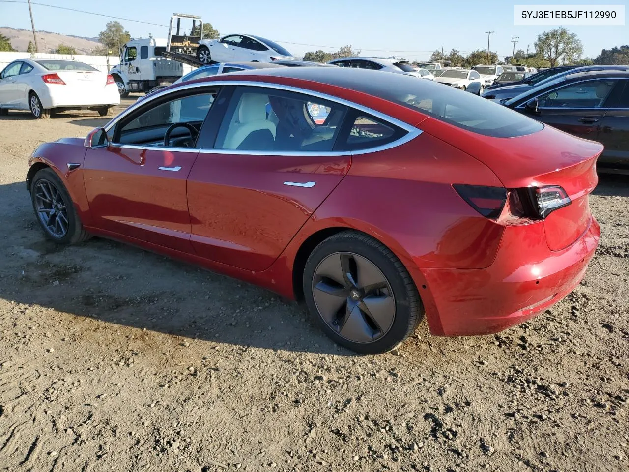 2018 Tesla Model 3 VIN: 5YJ3E1EB5JF112990 Lot: 79271684