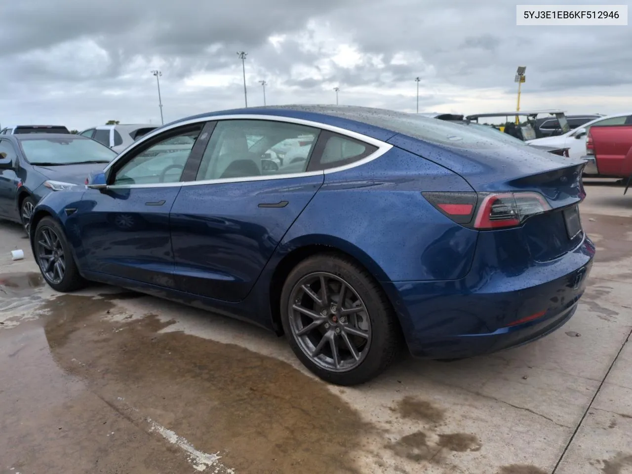 2019 Tesla Model 3 VIN: 5YJ3E1EB6KF512946 Lot: 74985534