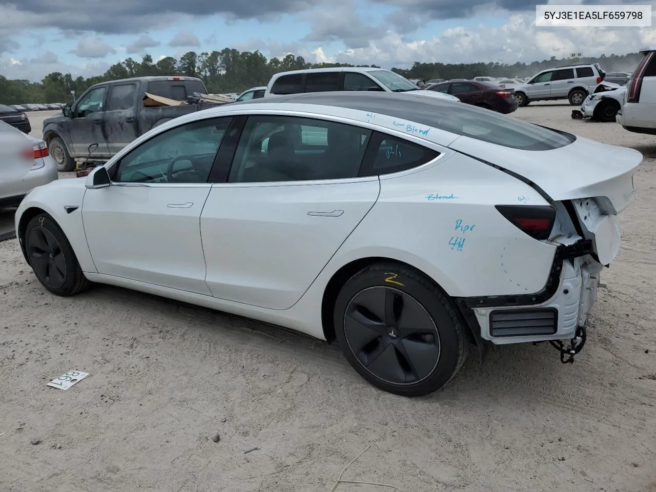 2020 Tesla Model 3 VIN: 5YJ3E1EA5LF659798 Lot: 69029944