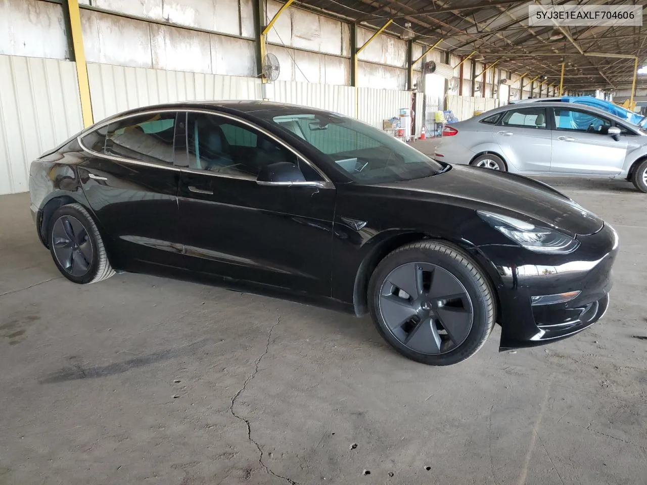 2020 Tesla Model 3 VIN: 5YJ3E1EAXLF704606 Lot: 74109294