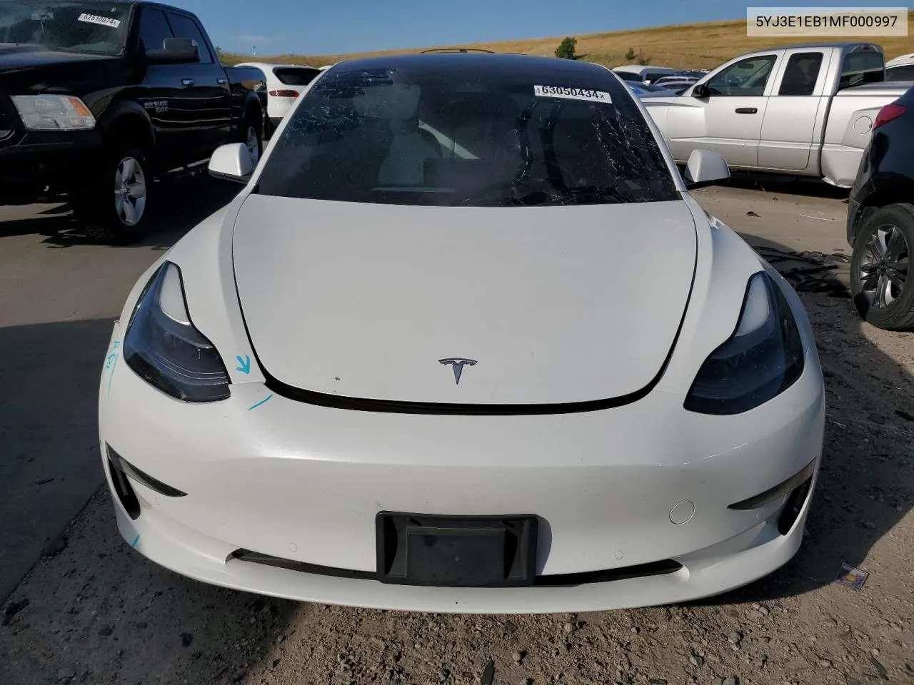 2021 Tesla Model 3 VIN: 5YJ3E1EB1MF000997 Lot: 63050434