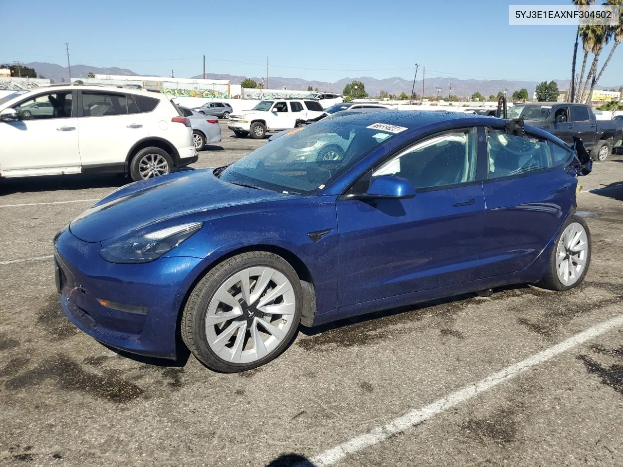 2022 Tesla Model 3 VIN: 5YJ3E1EAXNF304502 Lot: 77333144