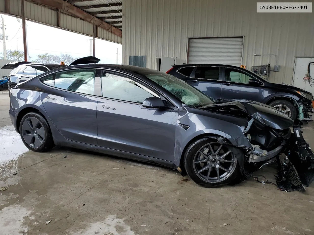 2023 Tesla Model 3 VIN: 5YJ3E1EB0PF677401 Lot: 68262334