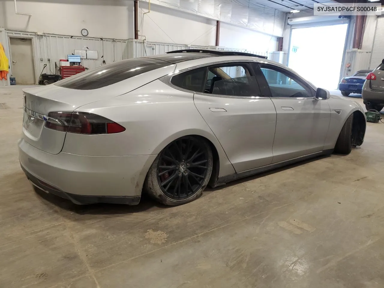 2012 Tesla Model S VIN: 5YJSA1DP6CFS00048 Lot: 75315674