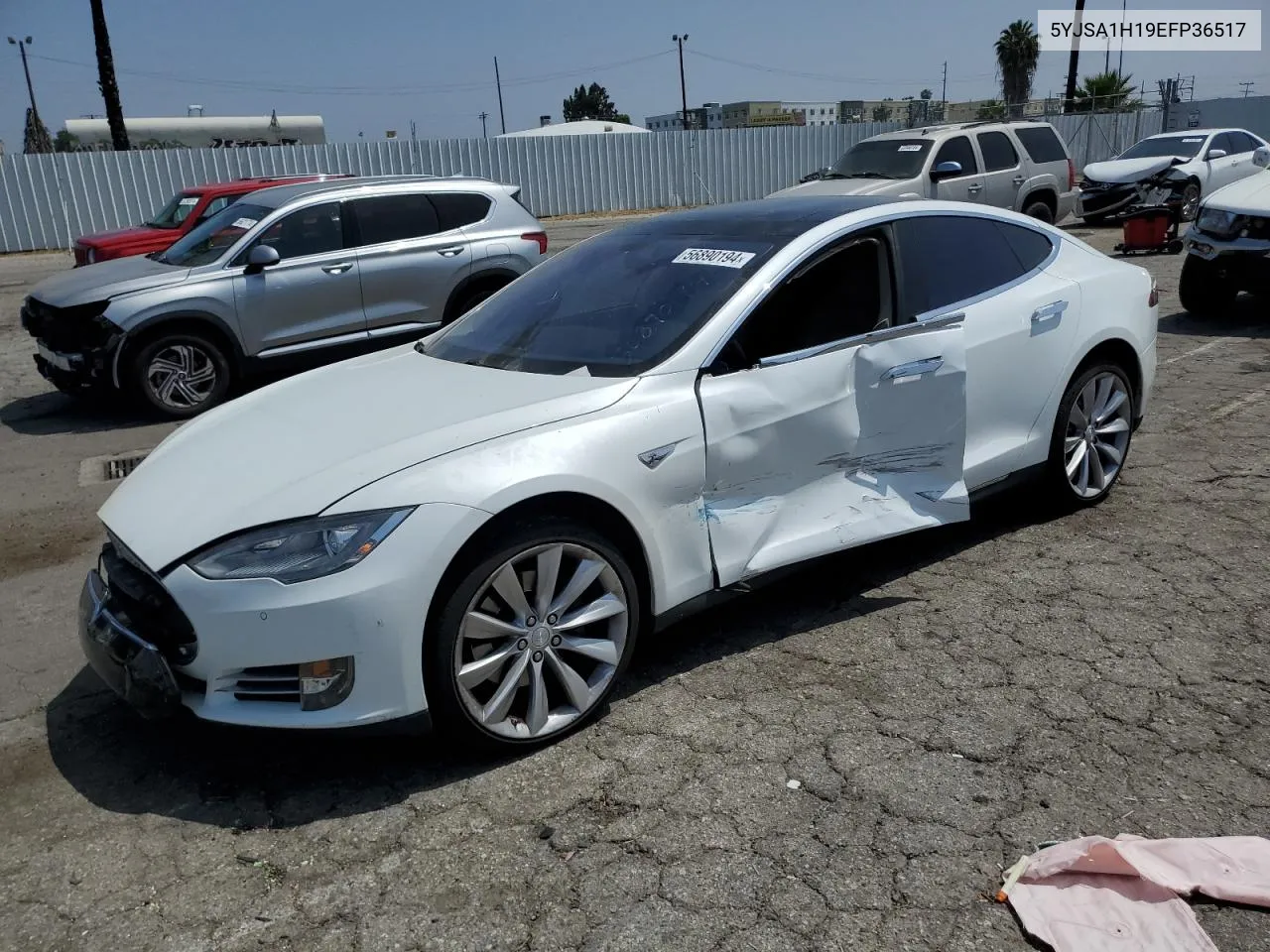 2014 Tesla Model S VIN: 5YJSA1H19EFP36517 Lot: 56890194