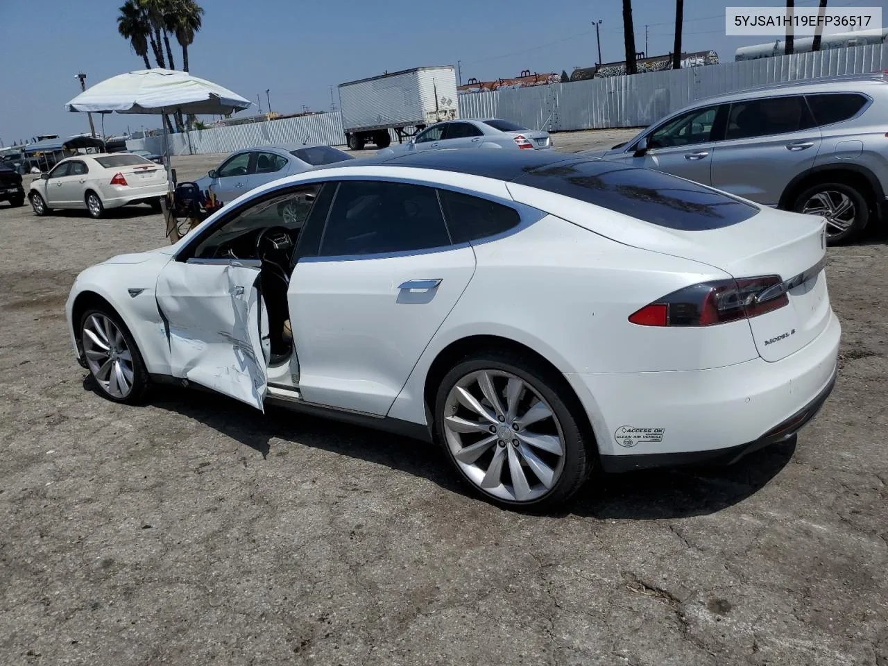 2014 Tesla Model S VIN: 5YJSA1H19EFP36517 Lot: 56890194