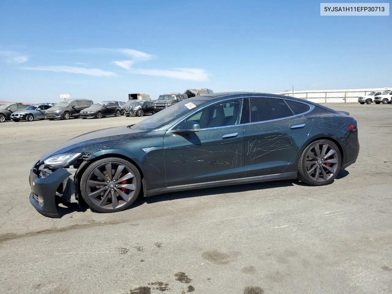 2014 Tesla Model S VIN: 5YJSA1H11EFP30713 Lot: 72656404