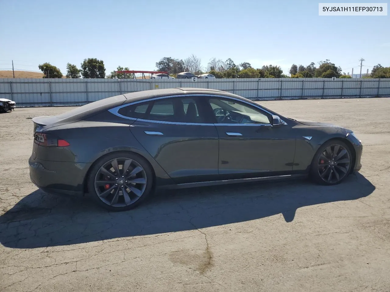 2014 Tesla Model S VIN: 5YJSA1H11EFP30713 Lot: 72656404