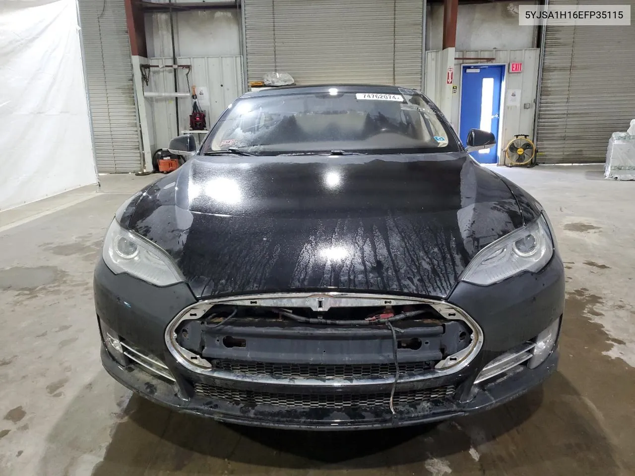 2014 Tesla Model S VIN: 5YJSA1H16EFP35115 Lot: 74762074