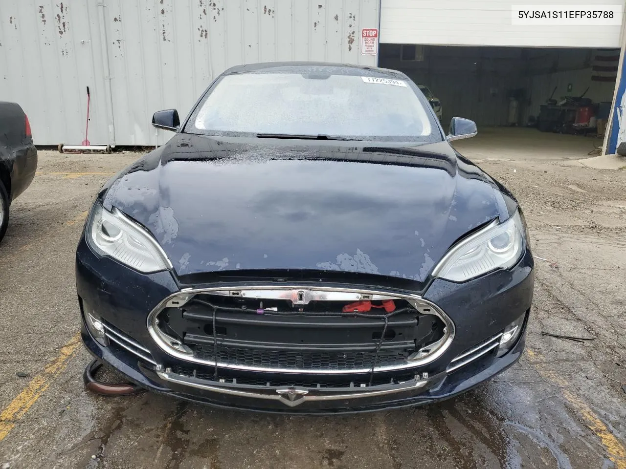 2014 Tesla Model S VIN: 5YJSA1S11EFP35788 Lot: 77225394