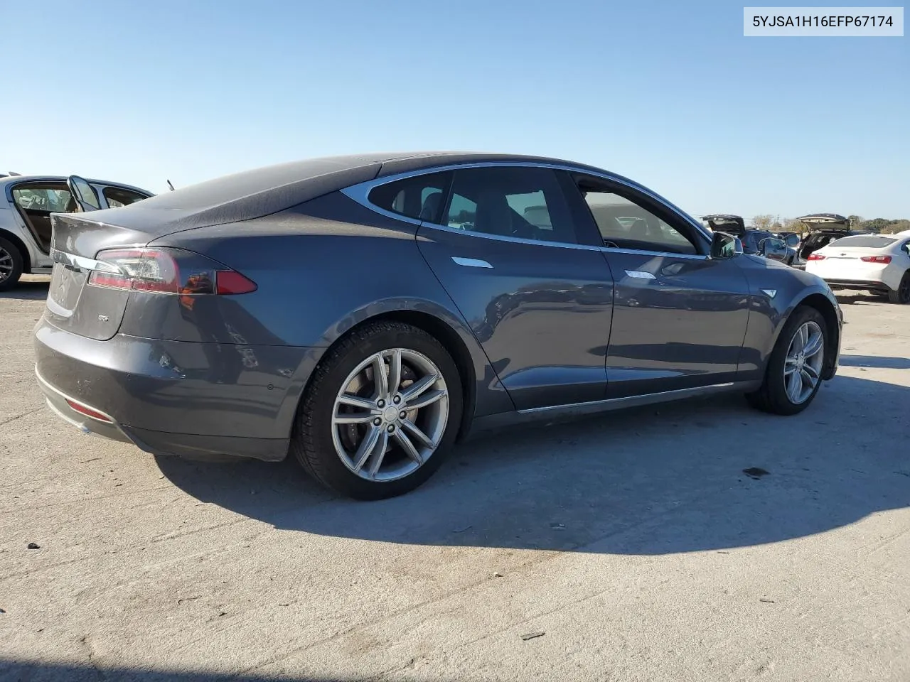 2014 Tesla Model S VIN: 5YJSA1H16EFP67174 Lot: 77702874