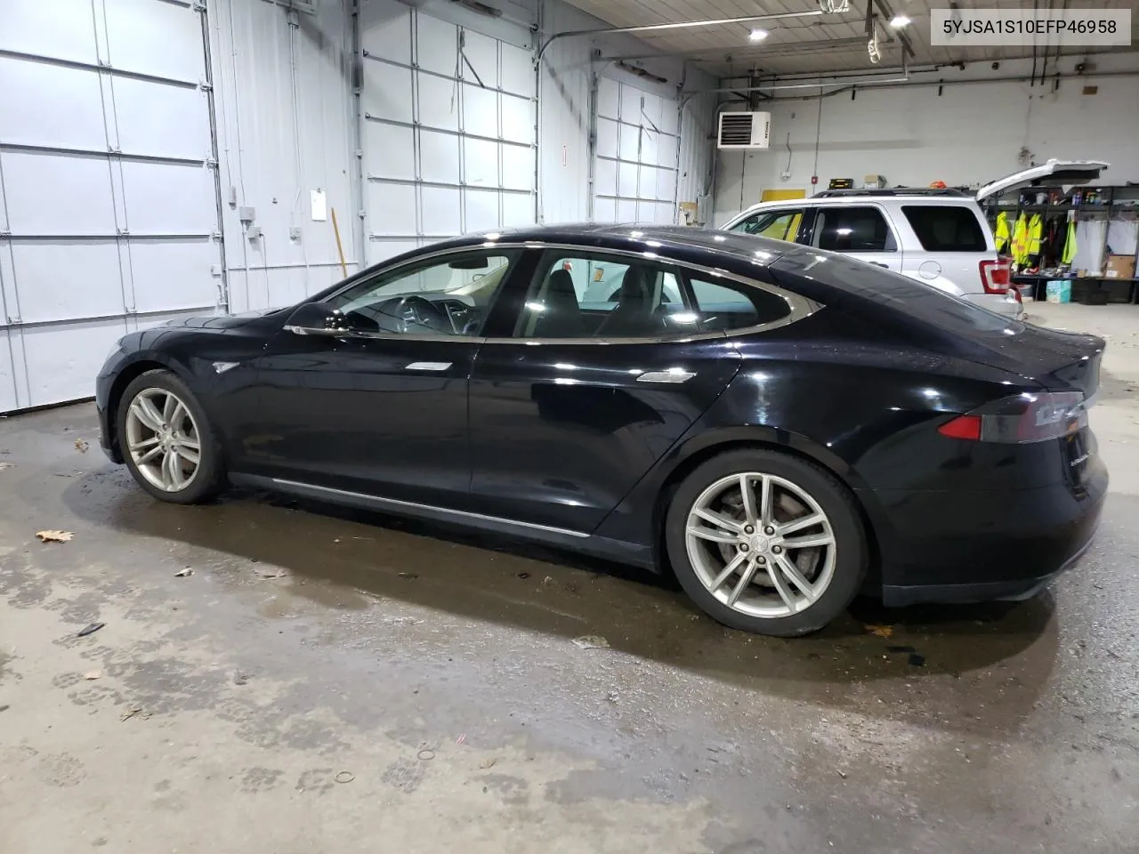 2014 Tesla Model S VIN: 5YJSA1S10EFP46958 Lot: 79953924