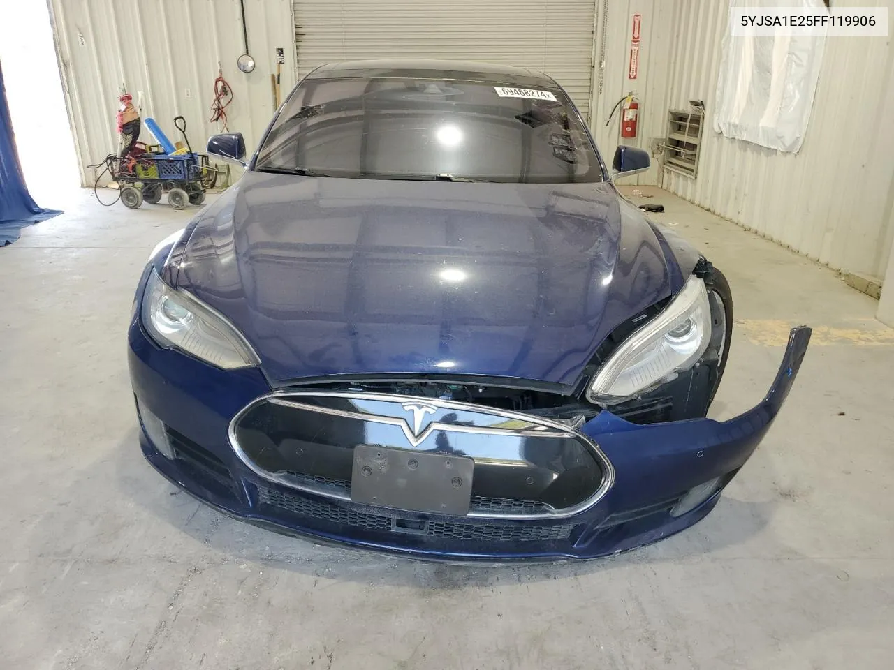 2015 Tesla Model S VIN: 5YJSA1E25FF119906 Lot: 69468274