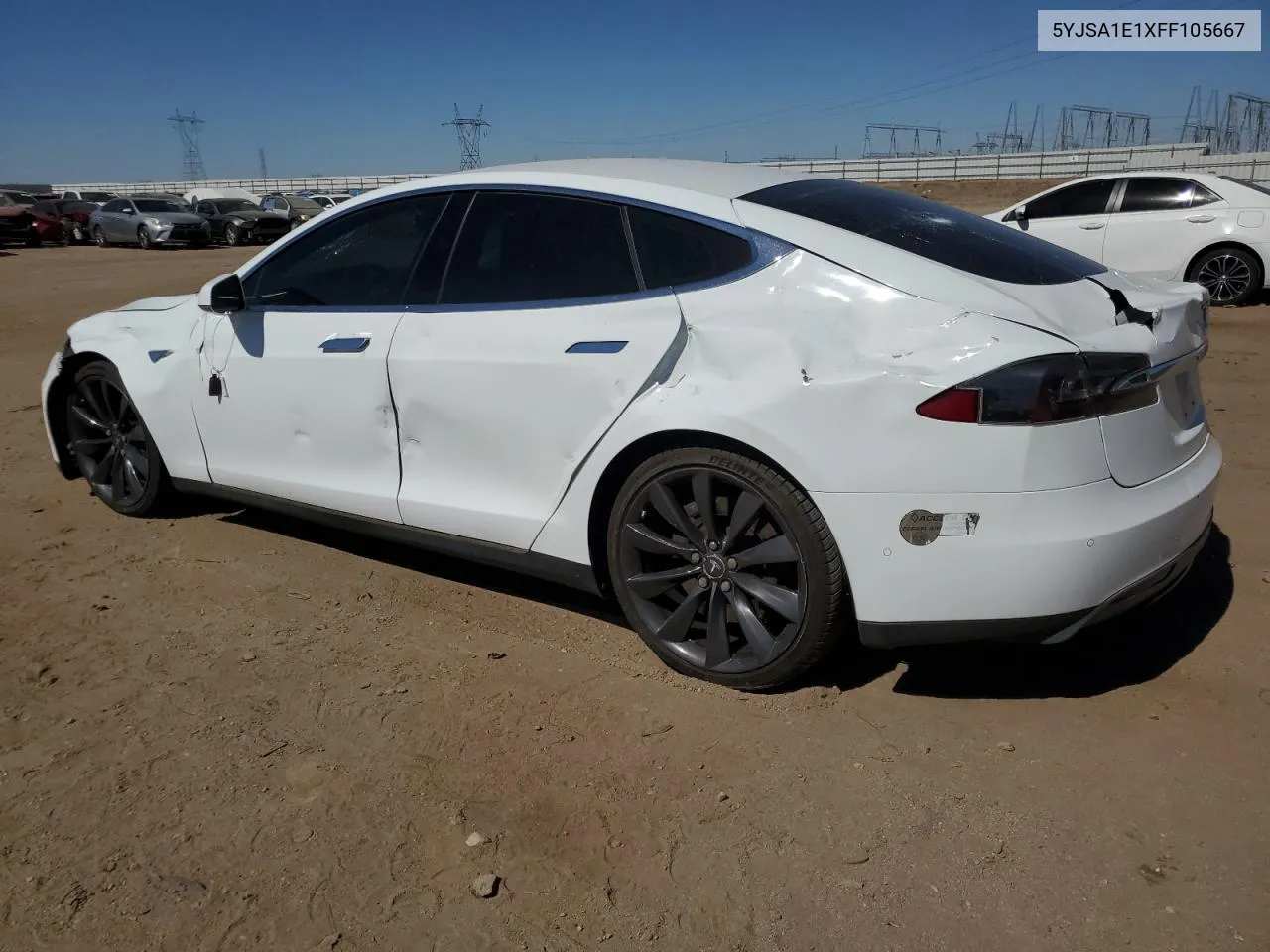 2015 Tesla Model S VIN: 5YJSA1E1XFF105667 Lot: 74743774