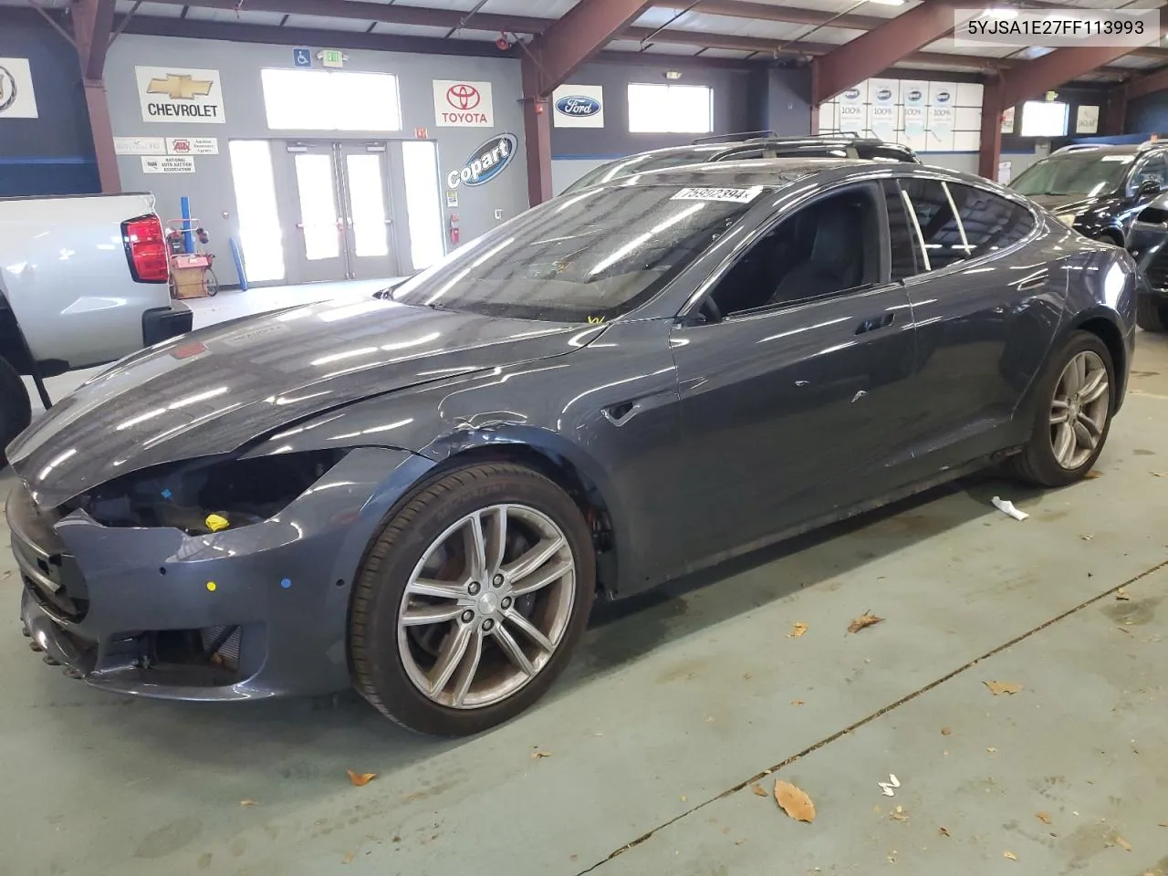 2015 Tesla Model S VIN: 5YJSA1E27FF113993 Lot: 75992394