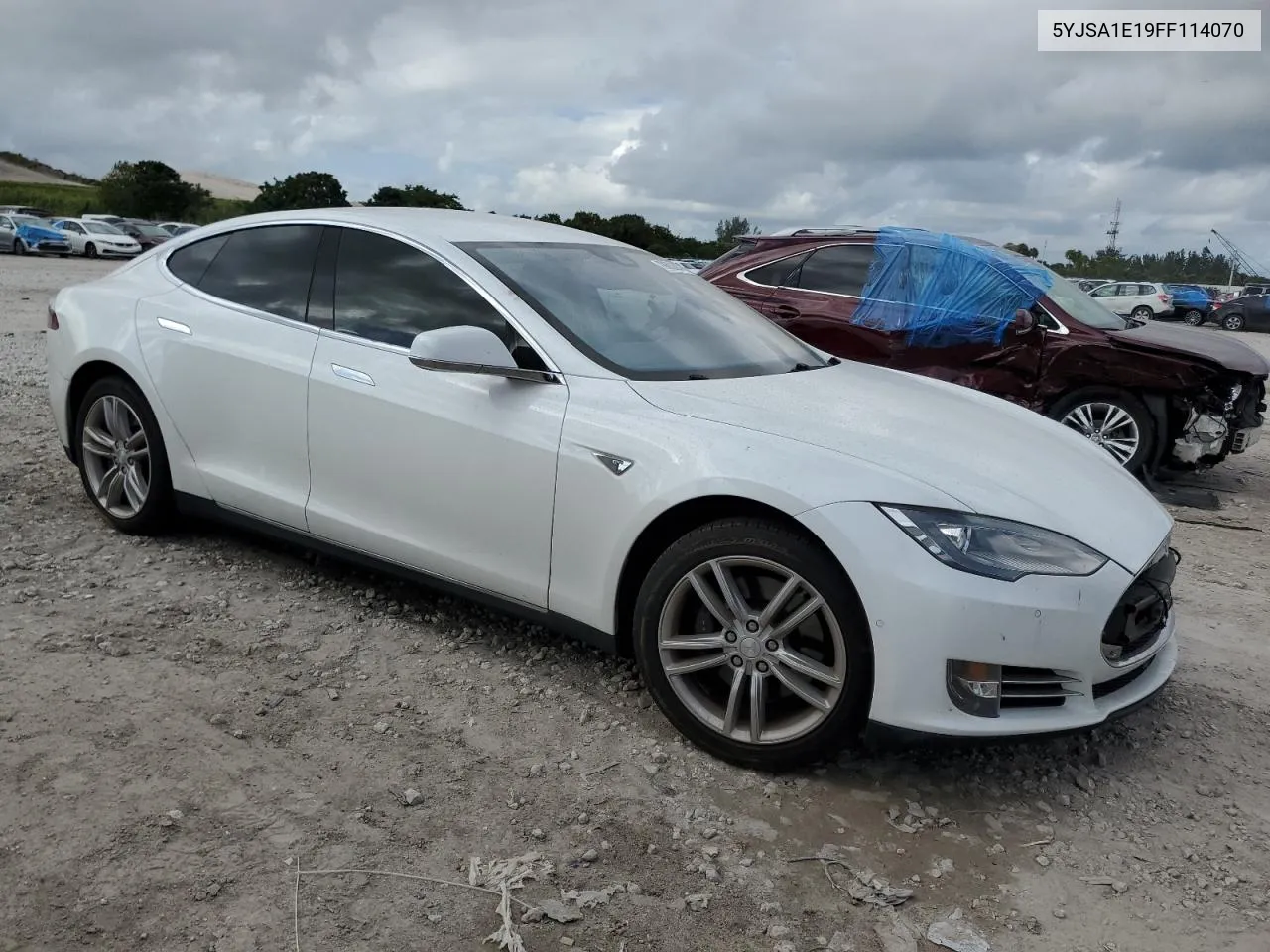 2015 Tesla Model S VIN: 5YJSA1E19FF114070 Lot: 79602694