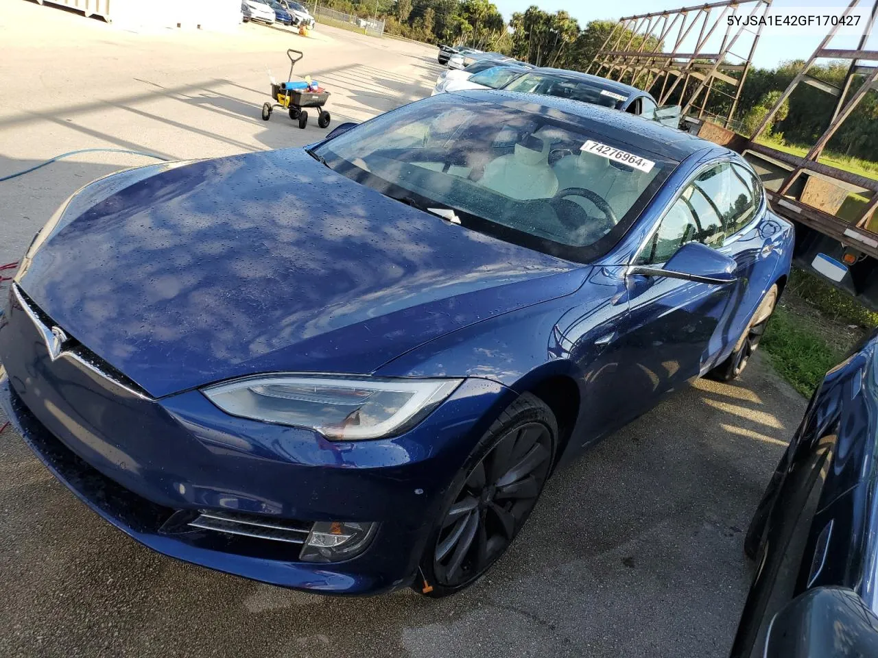 2016 Tesla Model S VIN: 5YJSA1E42GF170427 Lot: 74276964