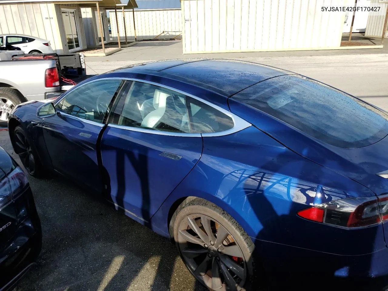 2016 Tesla Model S VIN: 5YJSA1E42GF170427 Lot: 74276964