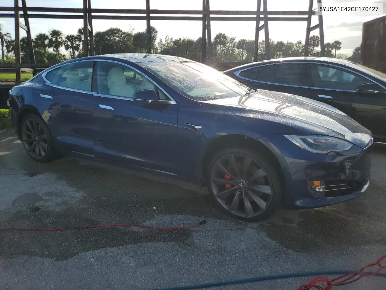 2016 Tesla Model S VIN: 5YJSA1E42GF170427 Lot: 74276964