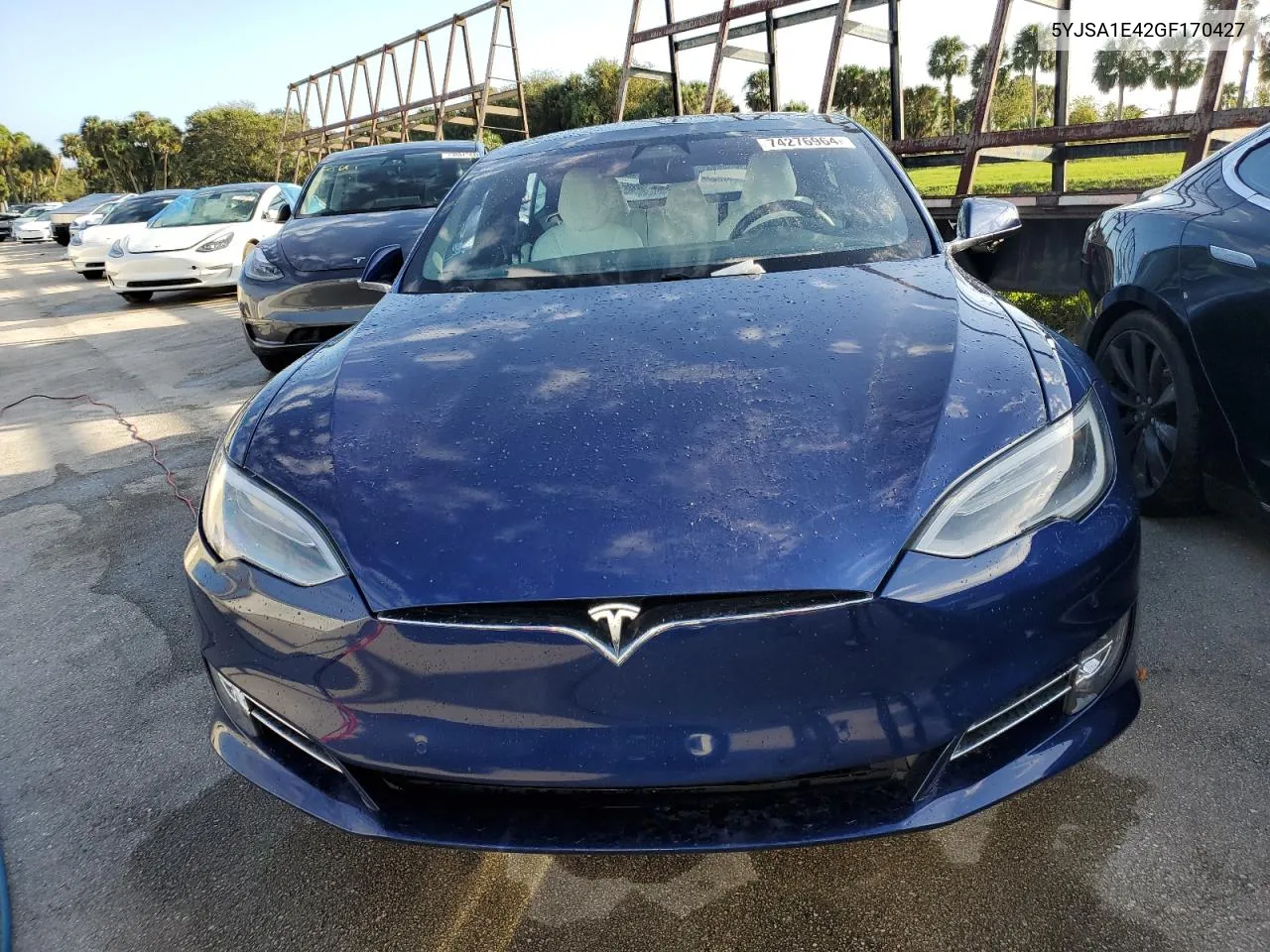 2016 Tesla Model S VIN: 5YJSA1E42GF170427 Lot: 74276964