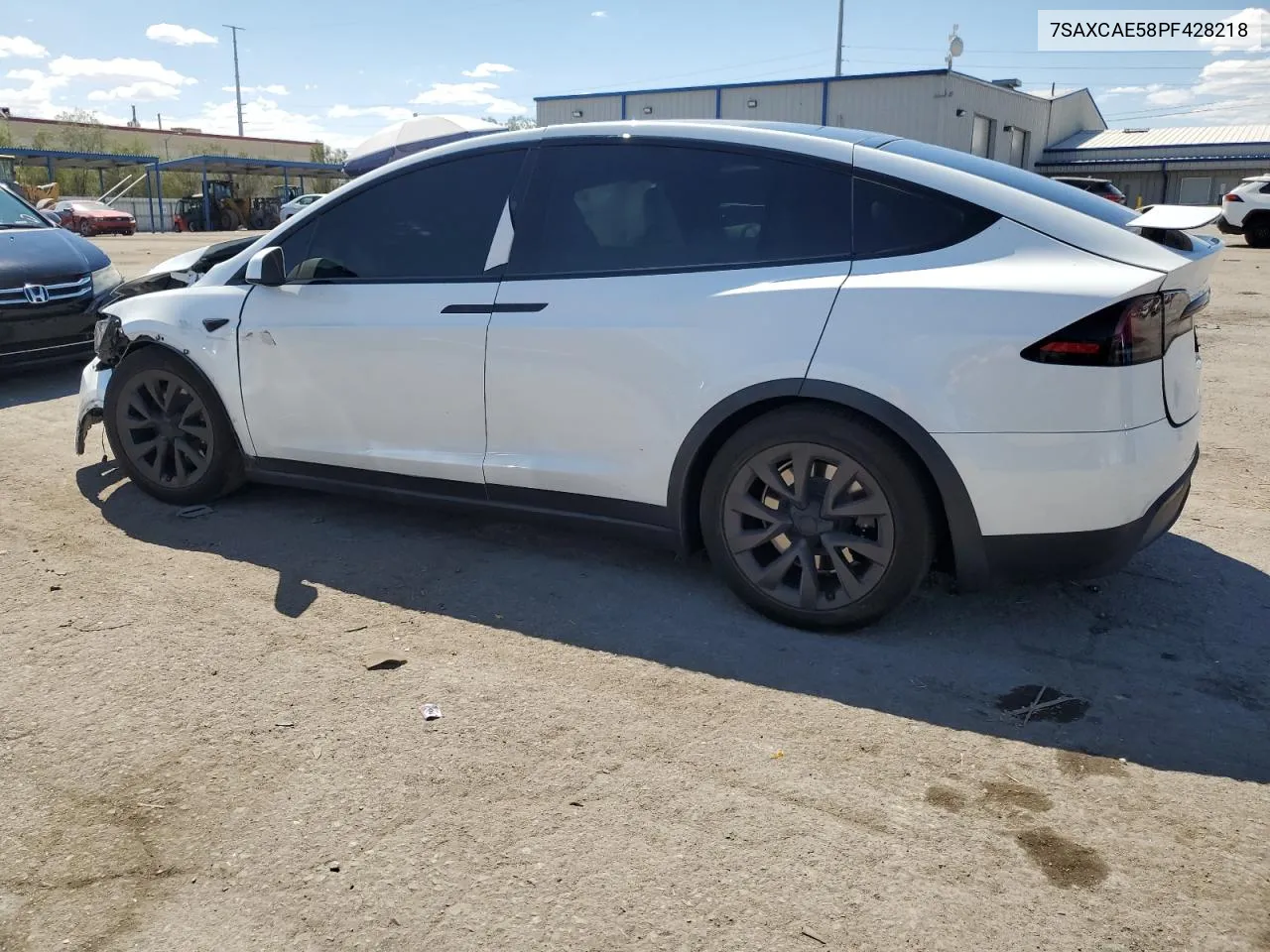 2023 Tesla Model X VIN: 7SAXCAE58PF428218 Lot: 69499404