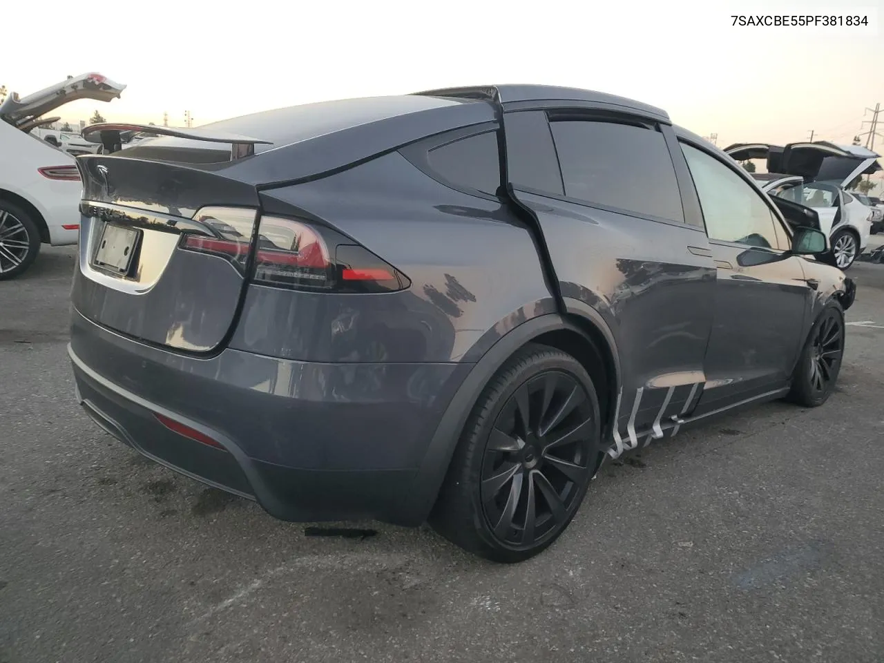 2023 Tesla Model X VIN: 7SAXCBE55PF381834 Lot: 77000564