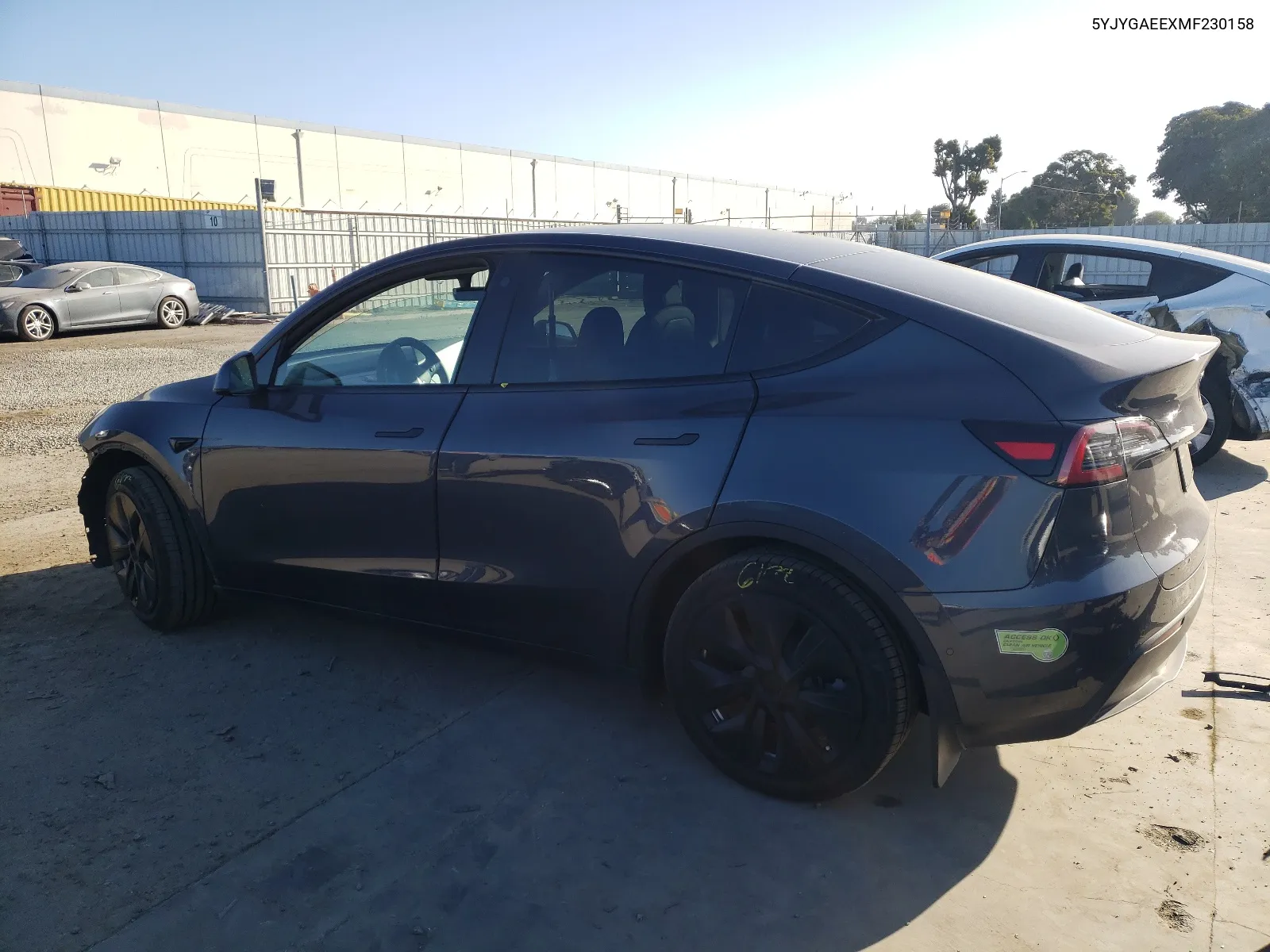 2021 Tesla Model Y VIN: 5YJYGAEEXMF230158 Lot: 66947484