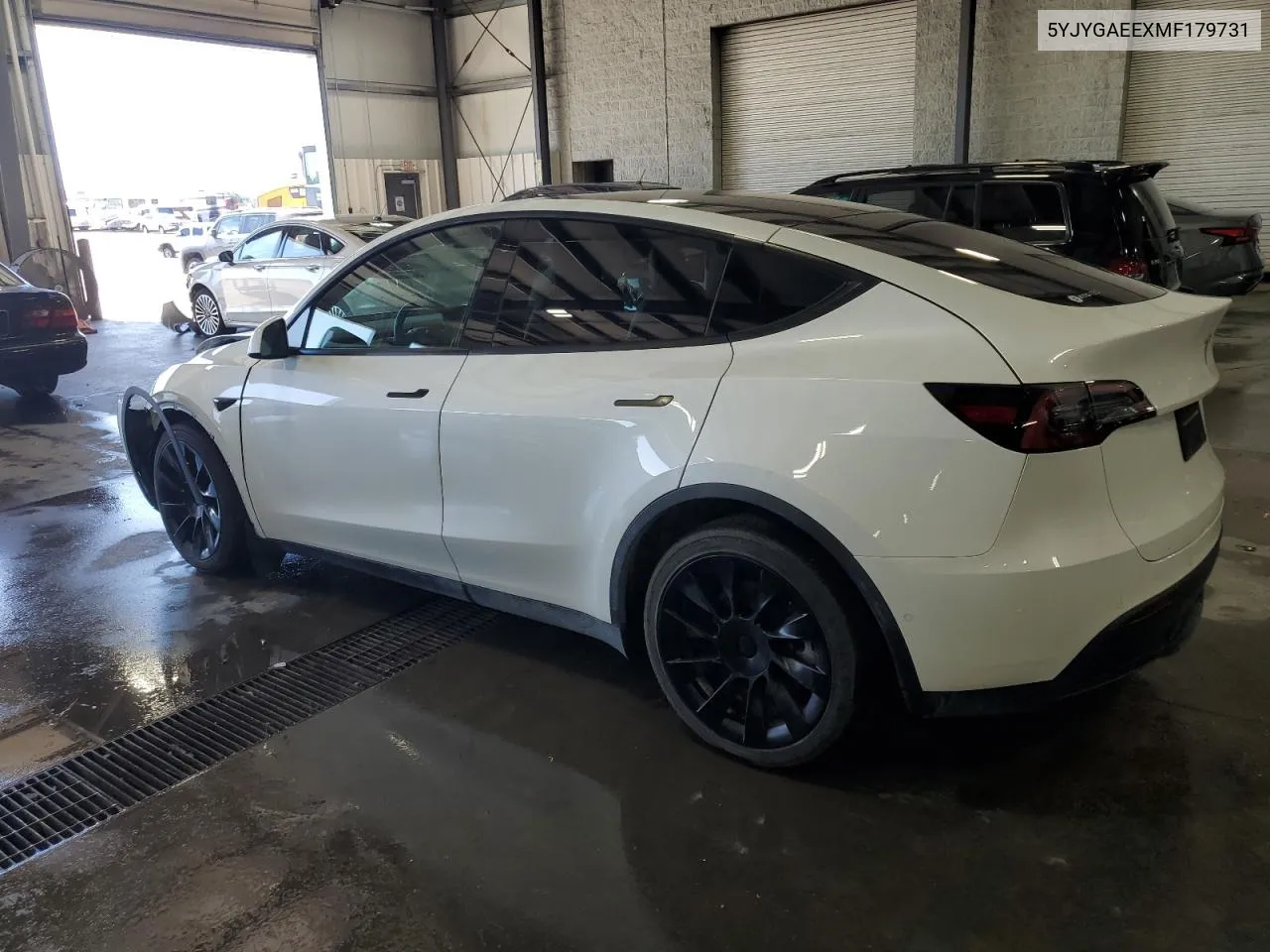 2021 Tesla Model Y VIN: 5YJYGAEEXMF179731 Lot: 69702344