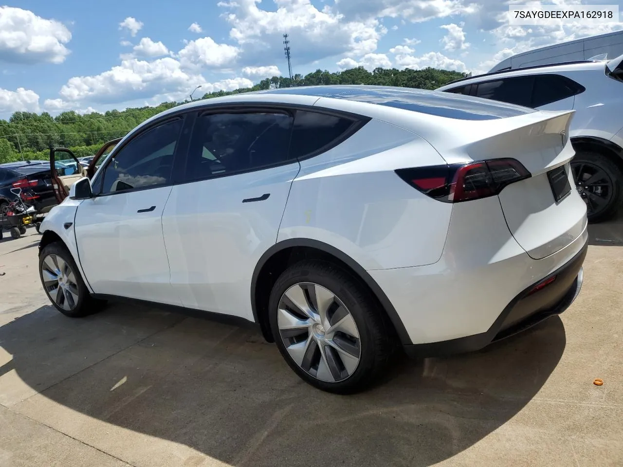 2023 Tesla Model Y VIN: 7SAYGDEEXPA162918 Lot: 55672694