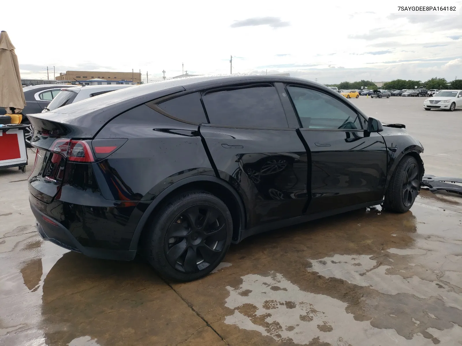 2023 Tesla Model Y VIN: 7SAYGDEE8PA164182 Lot: 59686224