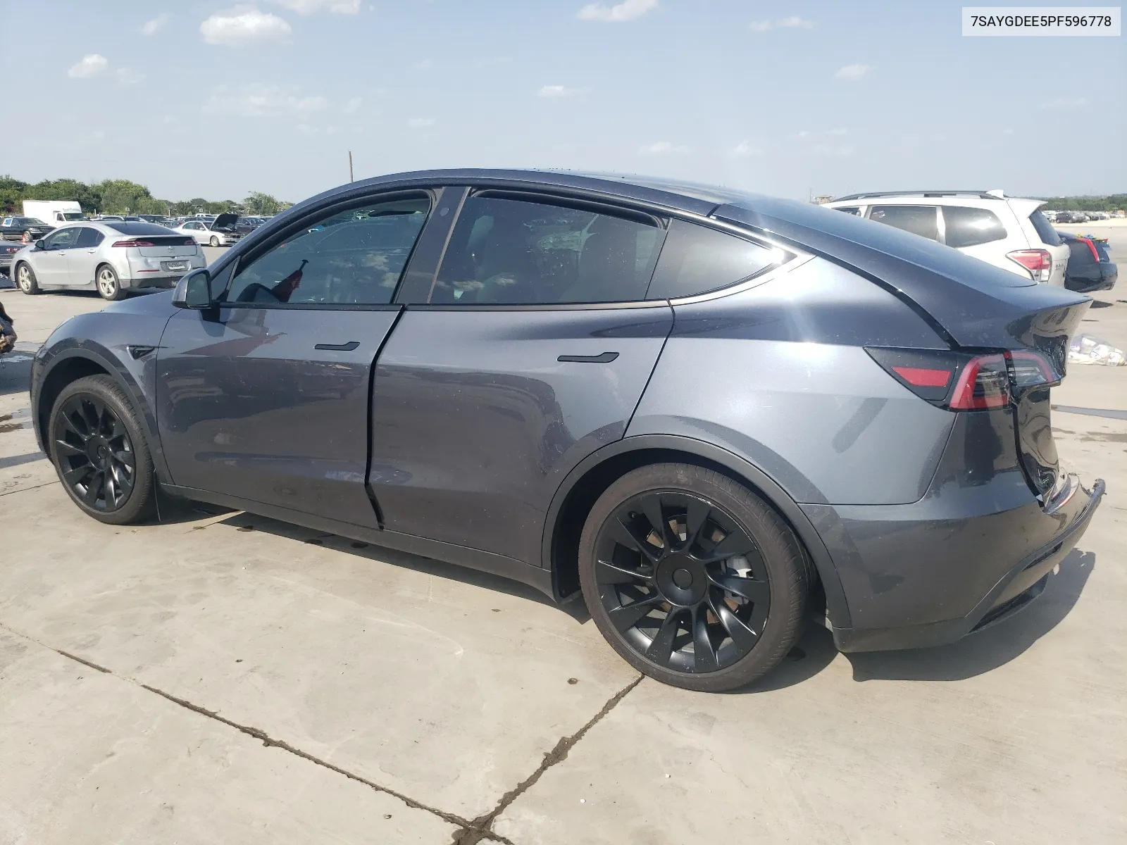 2023 Tesla Model Y VIN: 7SAYGDEE5PF596778 Lot: 62685944