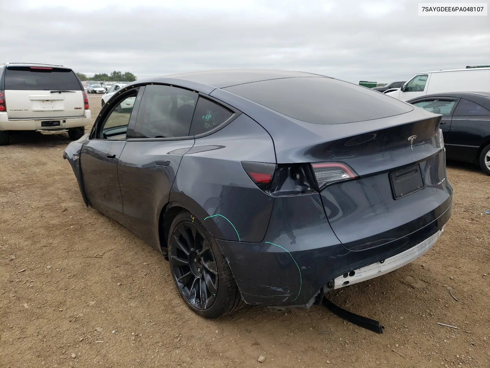 2023 Tesla Model Y VIN: 7SAYGDEE6PA048107 Lot: 65110614