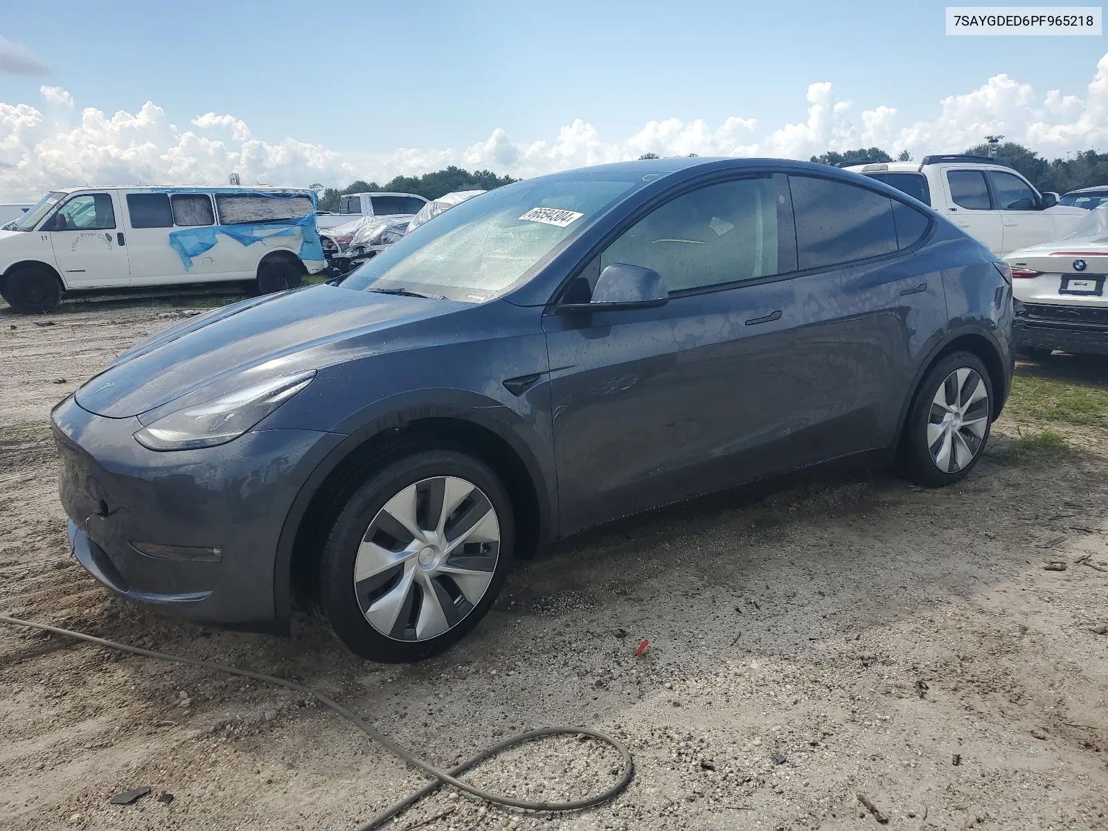 2023 Tesla Model Y VIN: 7SAYGDED6PF965218 Lot: 66594304