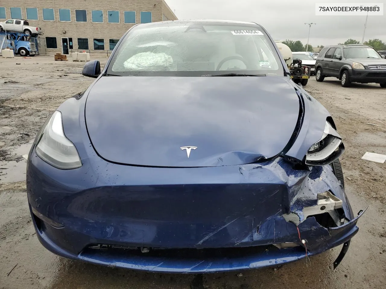 2023 Tesla Model Y VIN: 7SAYGDEEXPF948883 Lot: 66614654