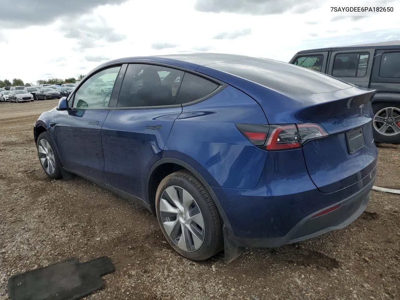 2023 Tesla Model Y VIN: 7SAYGDEE6PA182650 Lot: 69033854