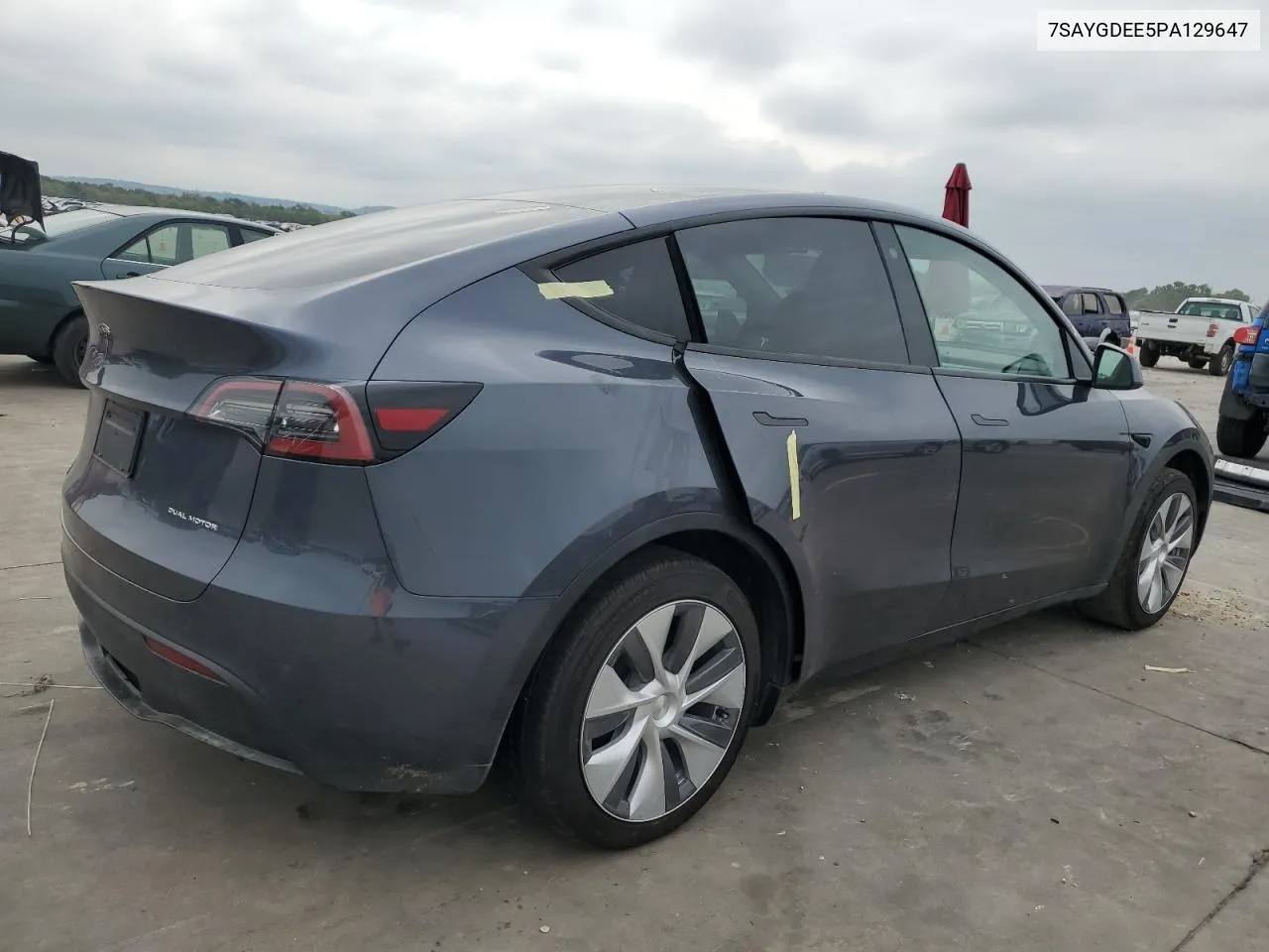 2023 Tesla Model Y VIN: 7SAYGDEE5PA129647 Lot: 70026014