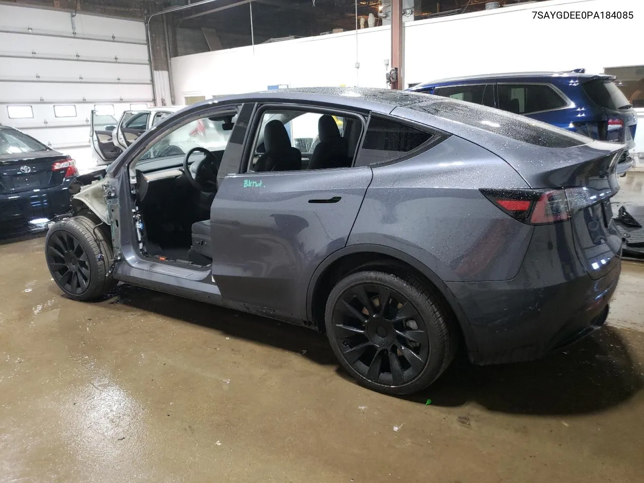 2023 Tesla Model Y VIN: 7SAYGDEE0PA184085 Lot: 73204554