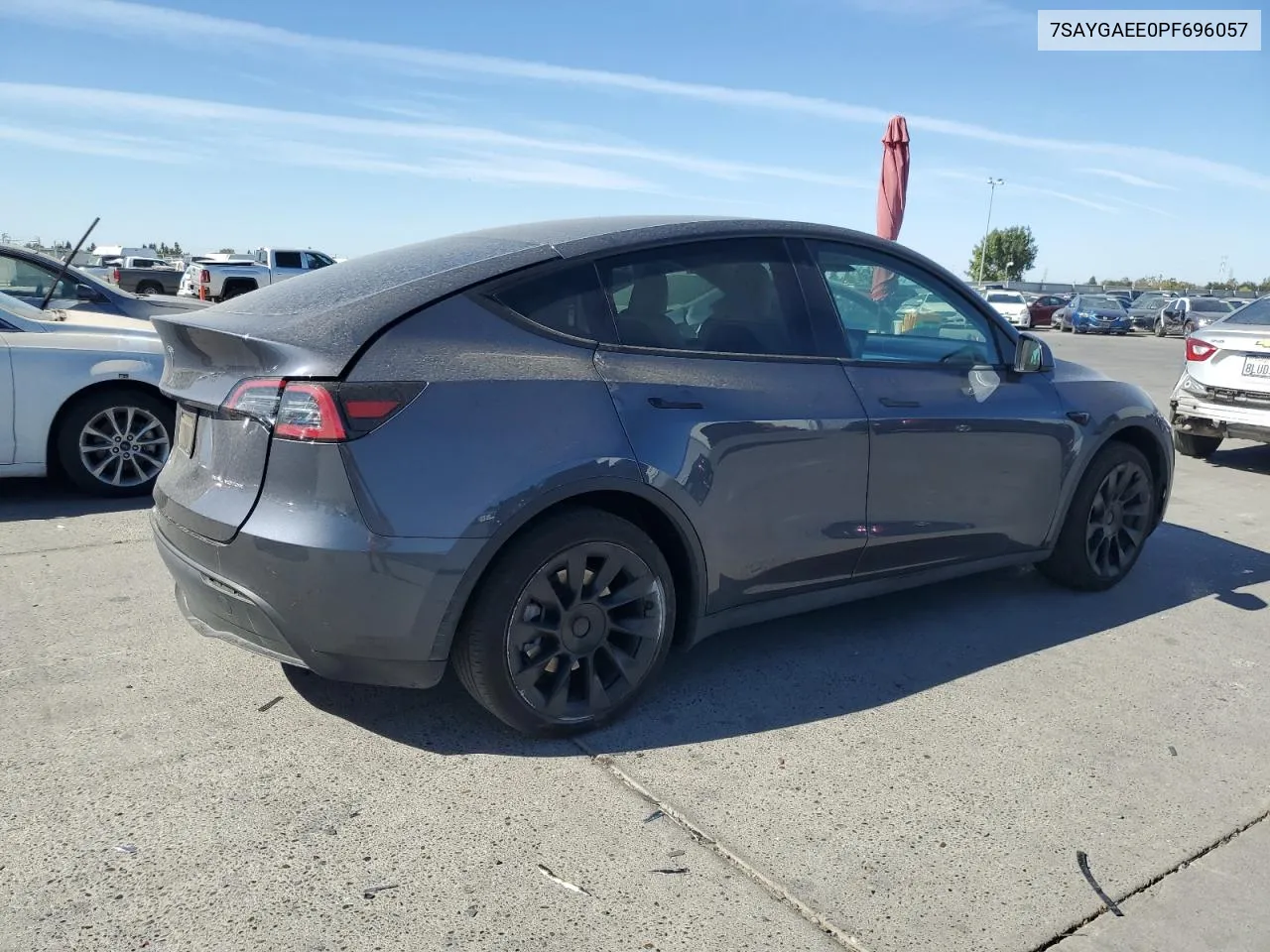 2023 Tesla Model Y VIN: 7SAYGAEE0PF696057 Lot: 76785374