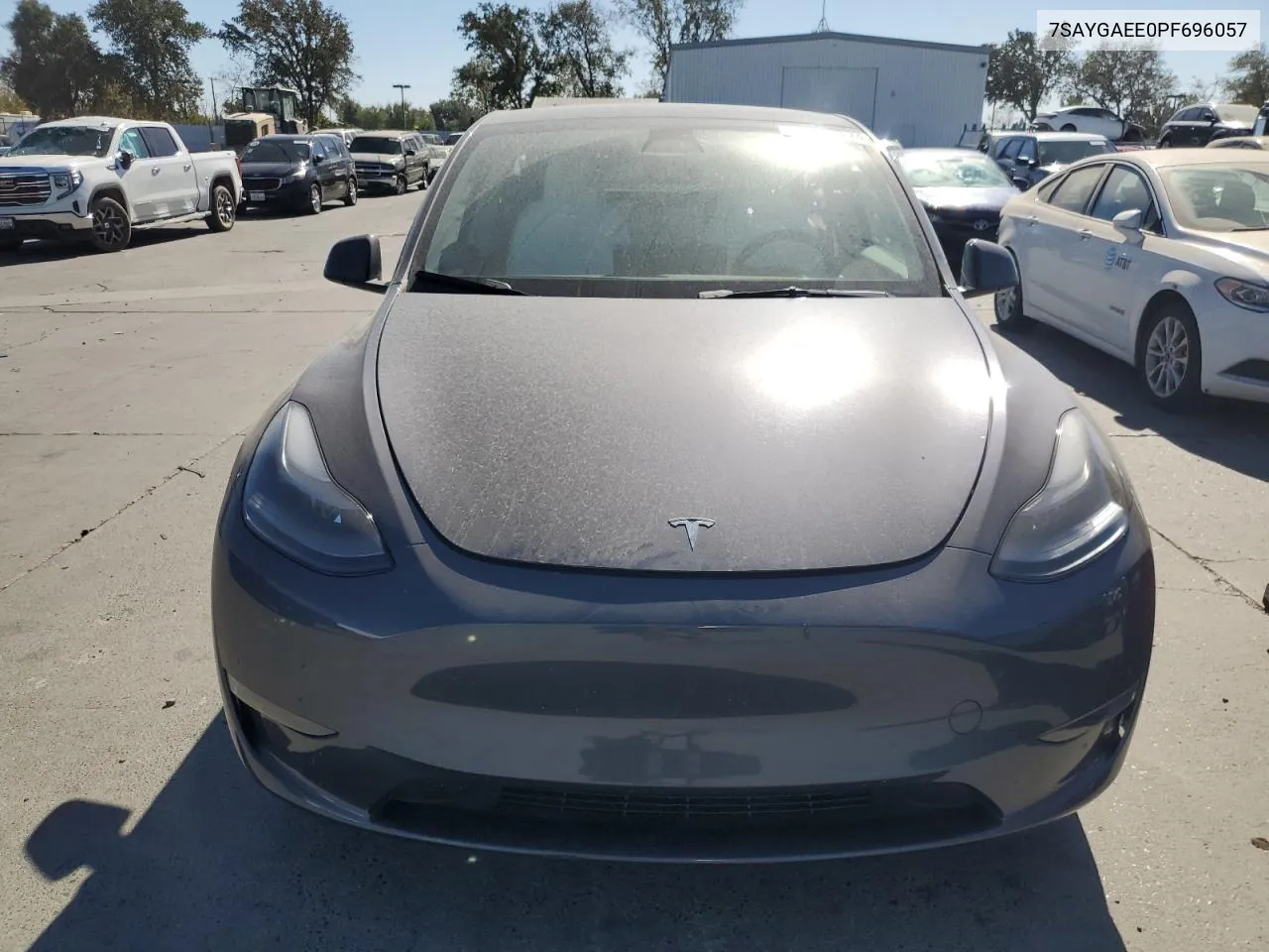 2023 Tesla Model Y VIN: 7SAYGAEE0PF696057 Lot: 76785374