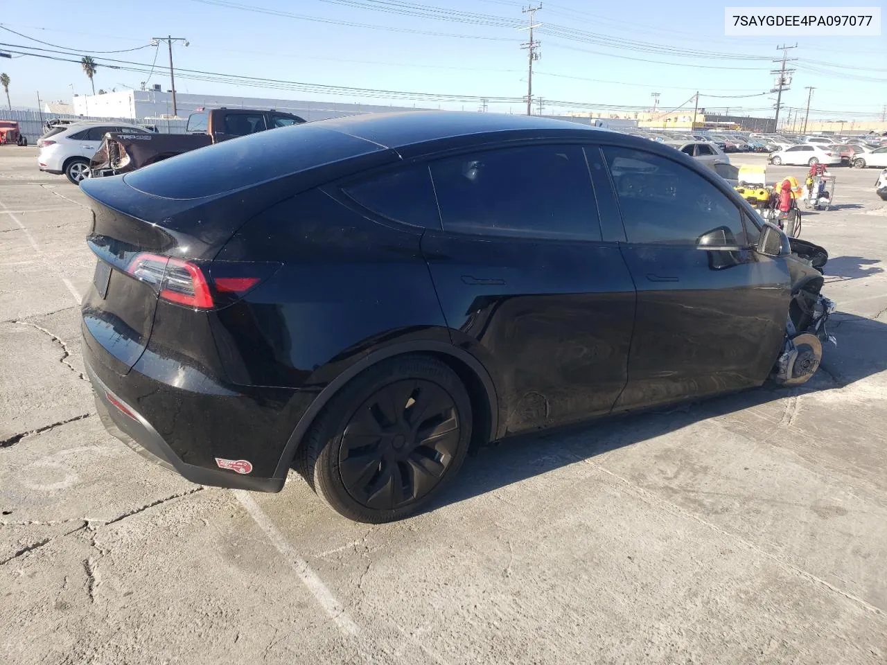 2023 Tesla Model Y VIN: 7SAYGDEE4PA097077 Lot: 81218764