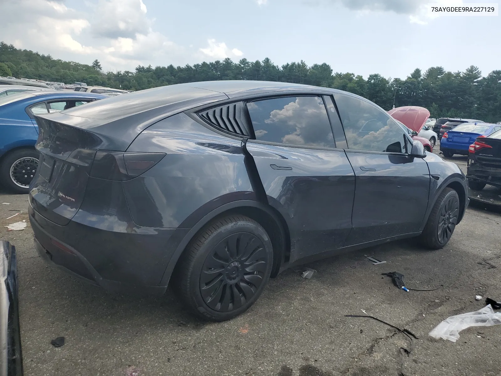 2024 Tesla Model Y VIN: 7SAYGDEE9RA227129 Lot: 58071254