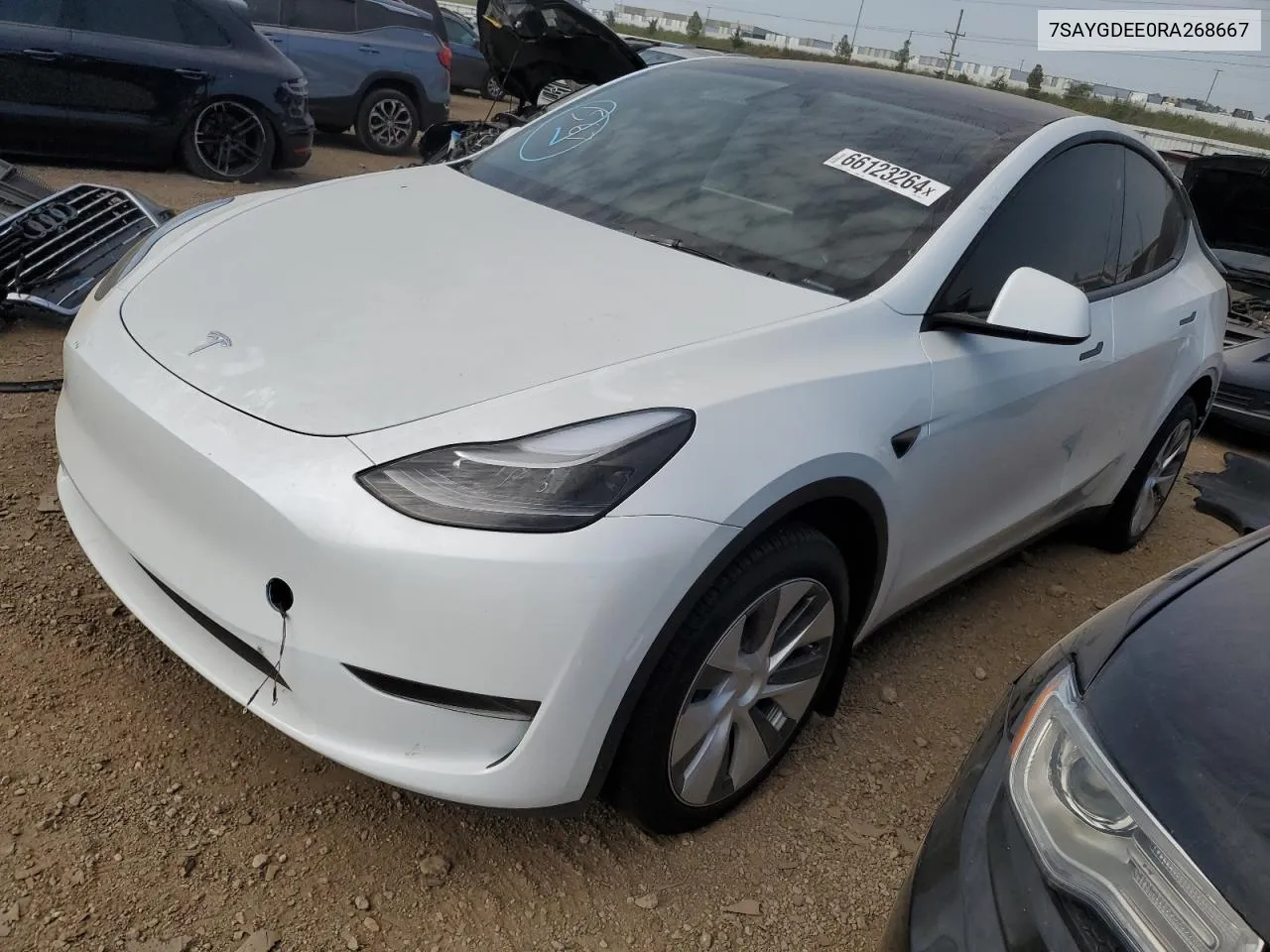 2024 Tesla Model Y VIN: 7SAYGDEE0RA268667 Lot: 66123264