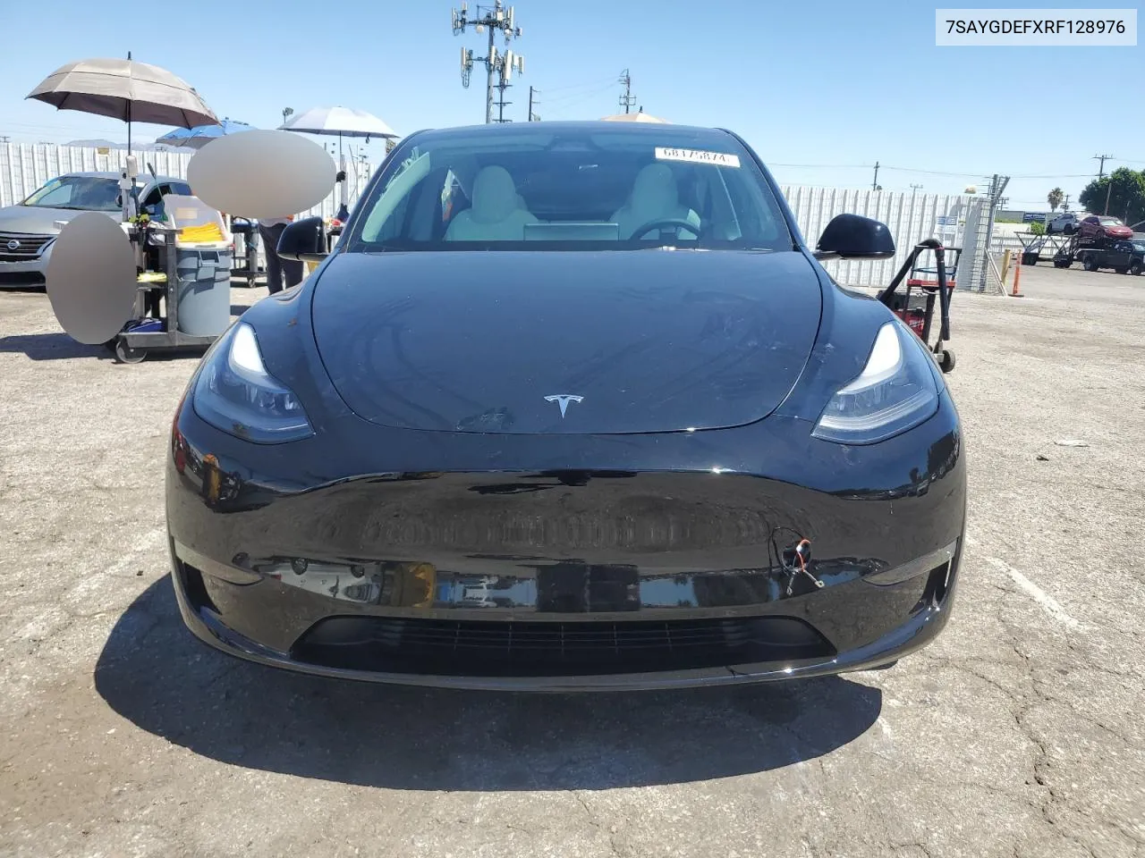 2024 Tesla Model Y VIN: 7SAYGDEFXRF128976 Lot: 68175874