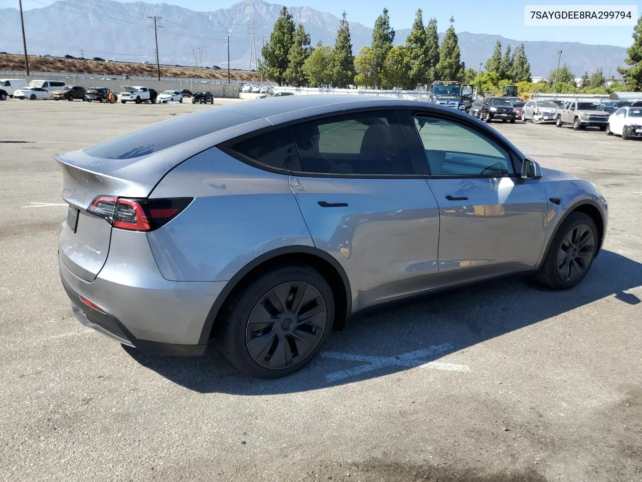 2024 Tesla Model Y VIN: 7SAYGDEE8RA299794 Lot: 69264374