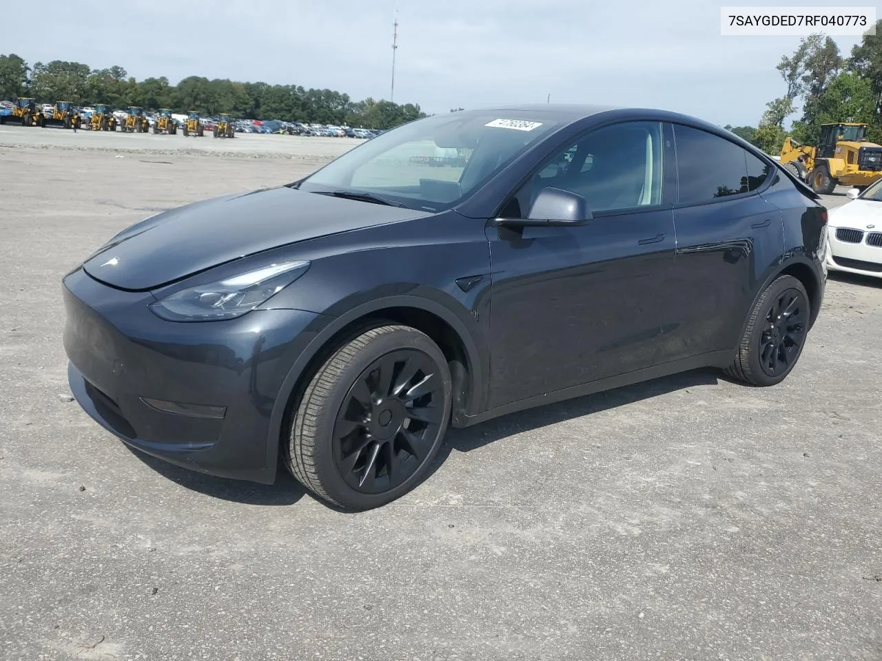 2024 Tesla Model Y VIN: 7SAYGDED7RF040773 Lot: 74760364