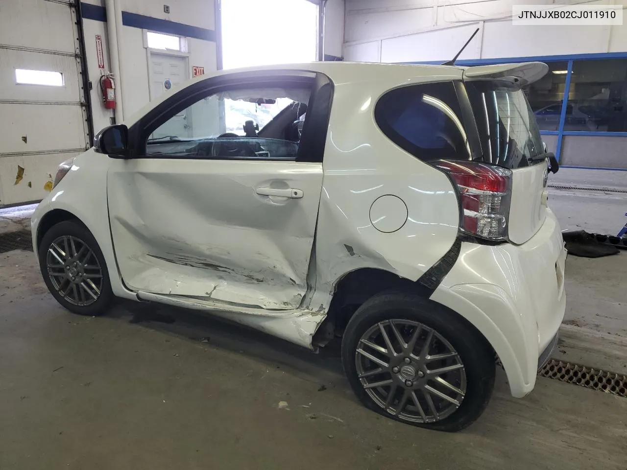 2012 Toyota Scion Iq VIN: JTNJJXB02CJ011910 Lot: 77388604