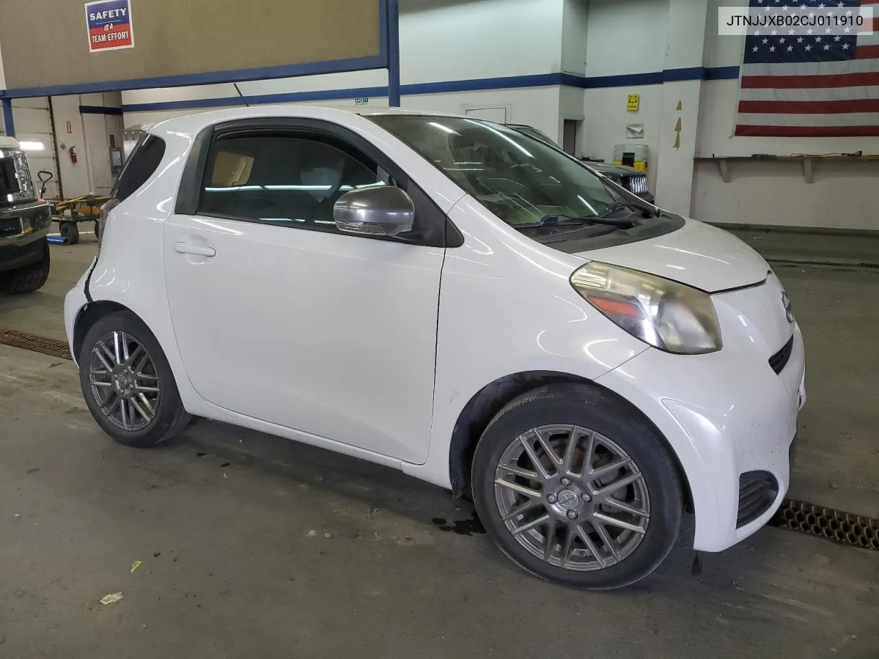 2012 Toyota Scion Iq VIN: JTNJJXB02CJ011910 Lot: 77388604